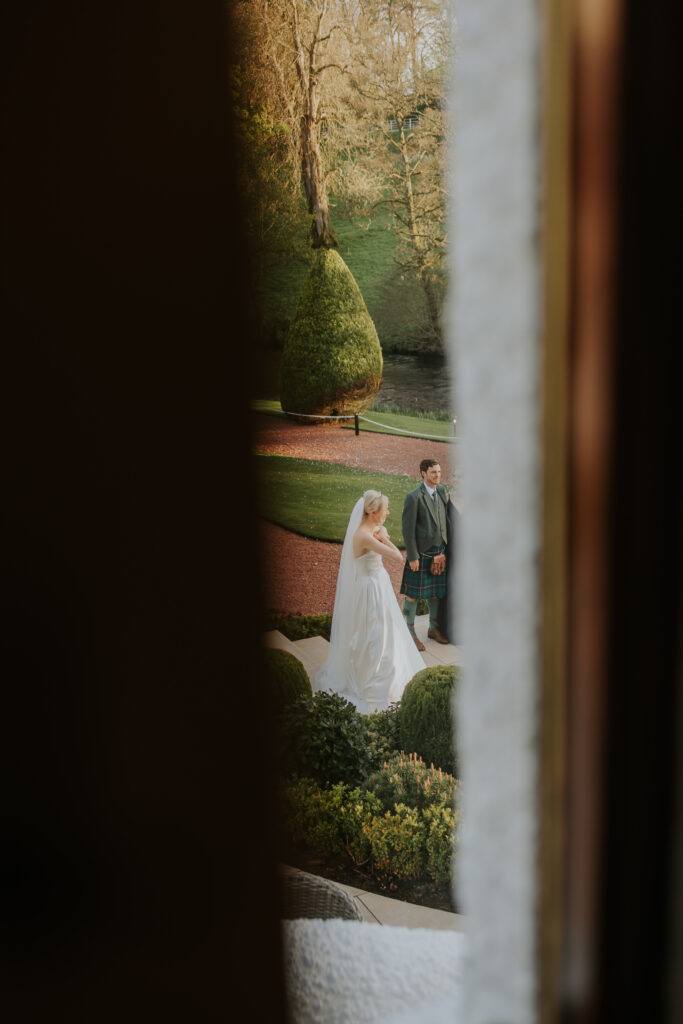 candid image of bride at brig o doon